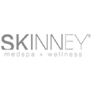 SKINNEY medspa + wellness logo in gray text on a white background.